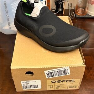 OOFOS Black Slip-On Recovery Shoe with Subtle Lime Heel Tab
